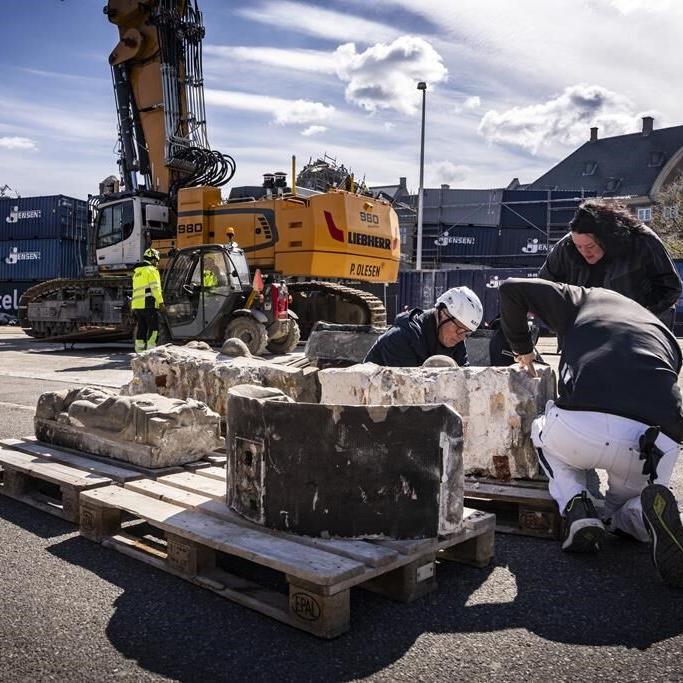 Traffic resumes near Copenhagen’s Old Stock Exchange after a fire ruined the 400-year-old landmark